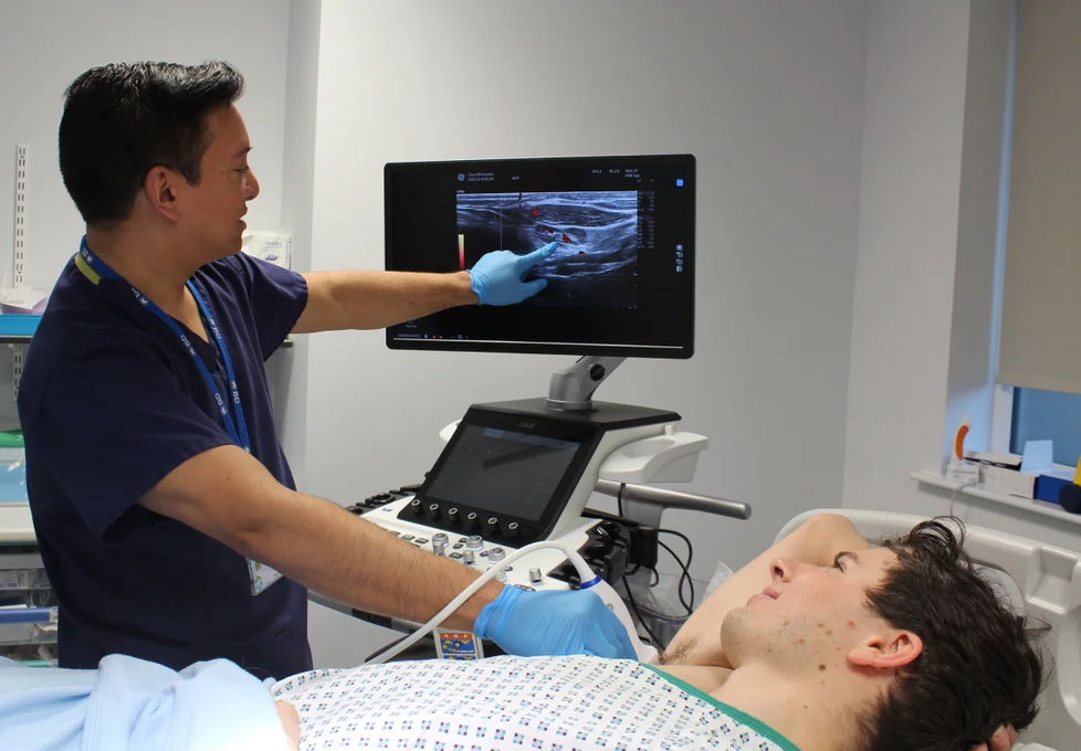 Medical Professional conducting lymph node ultrasound